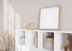 Empty square picture frame standing on sideboard in modern child room. Frame mock up in contemporary style. Free, copy space for picture, poster. Toys, pampas grass. Close up view. 3D rendering. photo