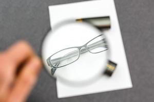 Glasses on paper with the engineer's office. photo
