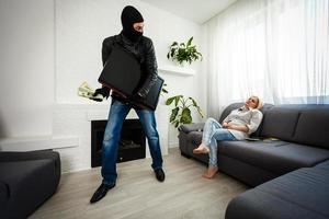 a thief man stole a TV. photo