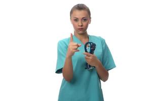 young female doctor holding stethoscope. isolated. photo