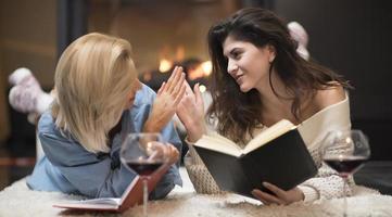 two female friends drinking wine. life stile concept. photo