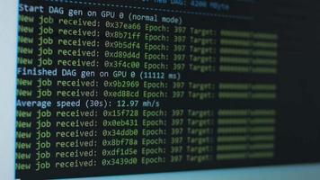 Cryptocurrency mining on a computer screen. The algorithm of the computer program on the monitor. Execution of the program code for the mining program. Pop-up lines of a computer program. video