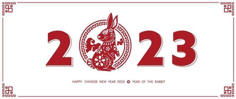 Chinese new year 2023 year of the rabbit. Lunar new year red rabbit zodiac with Chinese traditional frame, flower pattern and number on white background design concept. Vector illustration.
