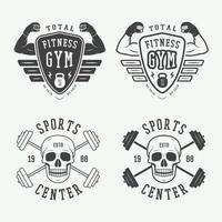 Set of gym logos, labels and badges in vintage style vector