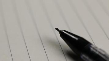 Close up of a Pen on notebook video