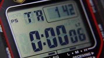 Macro close up of a tactical digital watch face functioning video