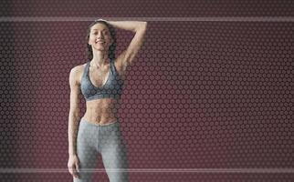 Textured digital background. Young woman with slim body shape in sportswear have fitness day indoors photo