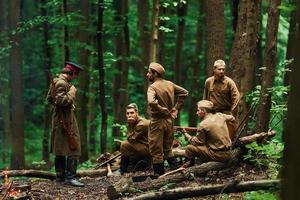 TERNOPIL, UKRAINE - June 2020 UPA Ukrainian Insurgent Army movie filming. Pictures of backstage. Soldiers taking a rest in the forest photo