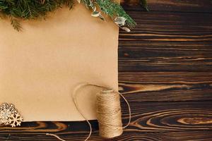 Yellow paper. Top view of christmas festive texture with new year decorations photo