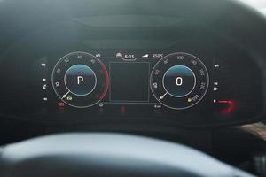 Digital speedometer. Close up focused view of brand new modern black automobile
