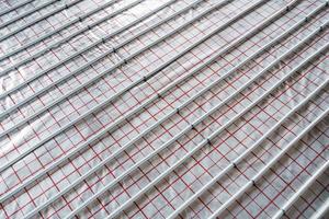 Pipes of underfloor heating system. Close up view. No people photo