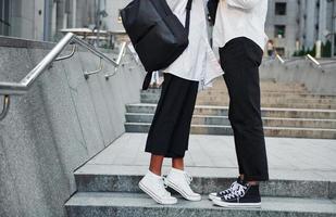 Close up view. Man with afrian american woman together in the city outdoors photo