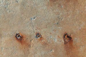 Old rusty textured metal surface. Conception of aging and decay photo