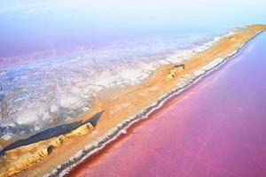 Amazing purple water. Aerial view of Jarilgach island in Ukraine. Majestic landscapes photo