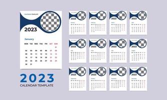 plantilla de calendario de pared mensual para el año 2023. calendario corporativo y de negocios. la semana comienza desde el domingo. Plantillas de 12 meses. Diseño de planificador de calendario de pared mínimo 2023 para plantilla de impresión. vector