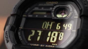 Macro close up of a tactical digital watch face functioning video