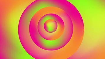 Abstract radial color gradient background with liquid style waves featured pink, orange, pink, and green. Seamless looping video animation