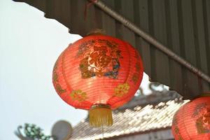 Chinese red lantern has written lucky and chinese pattern, decoration hanging celebrate for chinese new year. photo