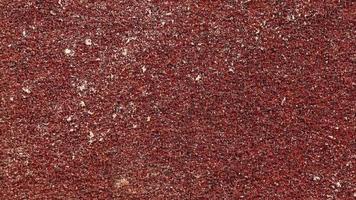 Red Sandpaper Texture loop. Rough Grit Abrasive Background. Used Grain Emery Backdrop. video