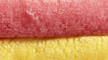 Yellow Light Red Colored Bubble Gum Texture loop. Freshness Gummy Delicious Background. Yummy Backdrop. Macro Closeup. video