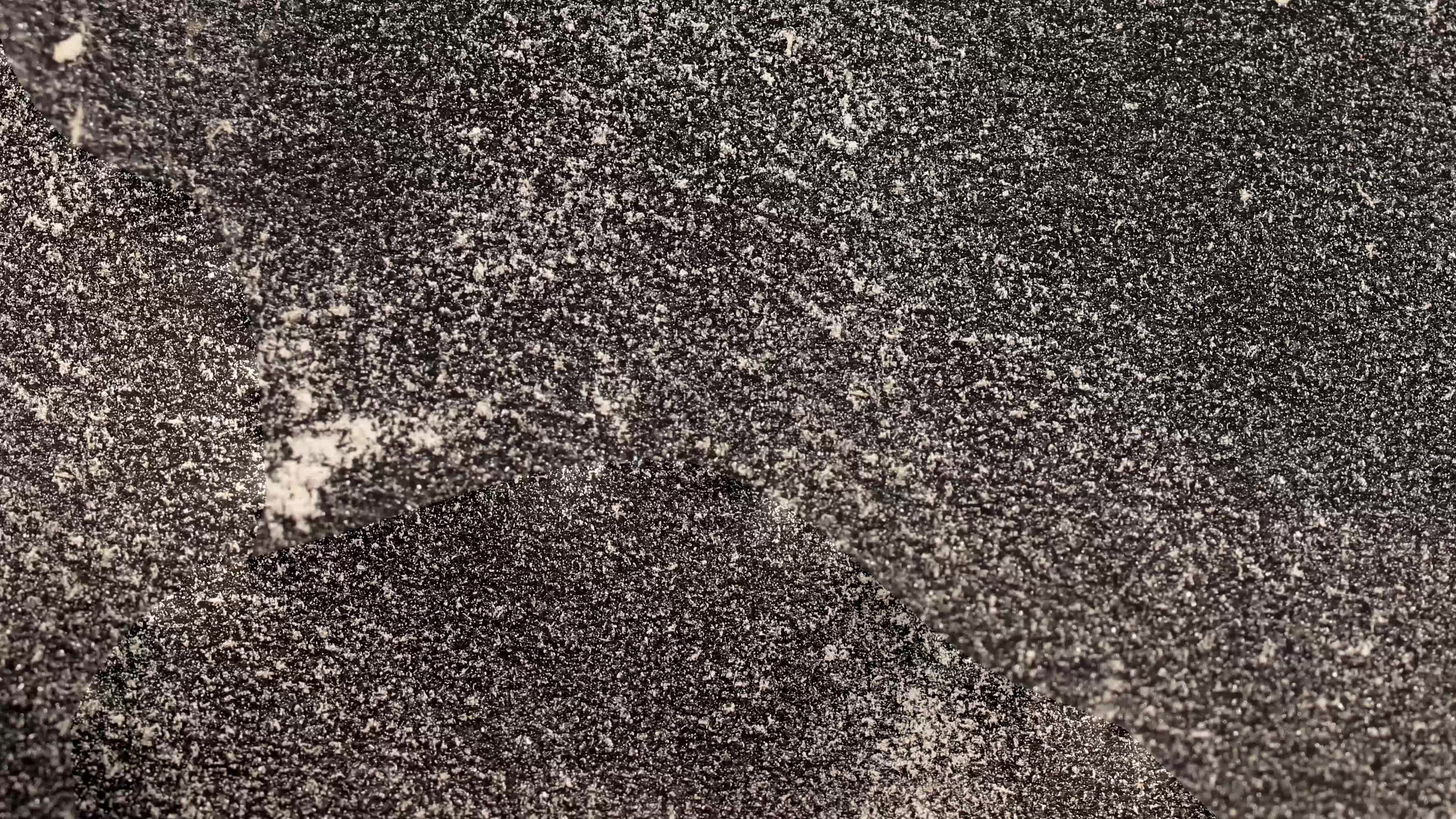 Sandpaper Texture loop. Rough Grit Abrasive Background. Used Grain