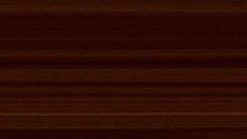 Dark wood surface seamless texture loop. Dark wooden board panel background. Horizontal along tree fibers direction. video