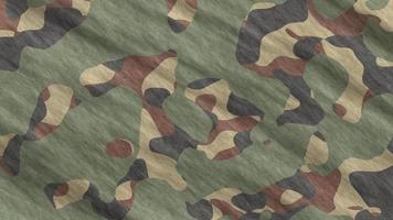fondo de camuflaje del ejército verde. textura de ropa de camuflaje militar. uniforme de combate sin costuras. video