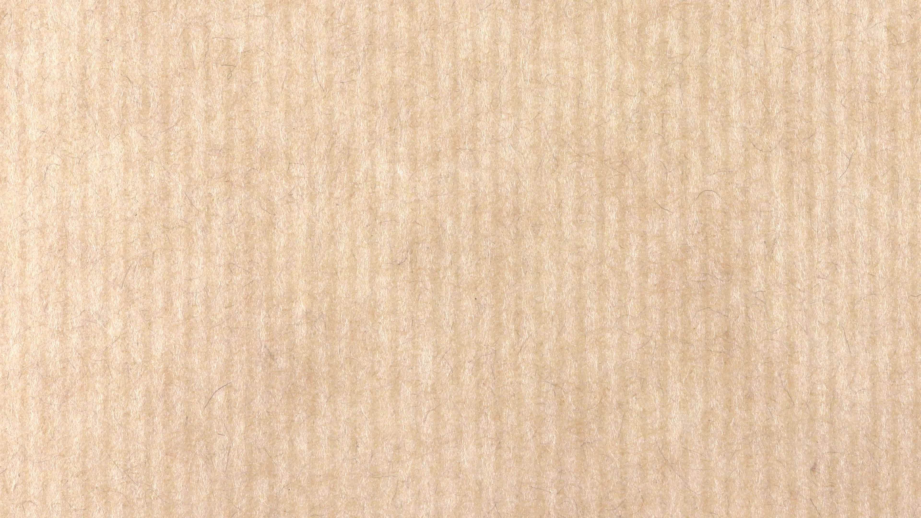 Decorative striped paper texture. Onion fibers decorated paper background. Kraft stripes paper pattern. Landscape horizontal orientation