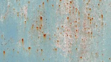 grano oxidado en la textura de la pared de pintura azul. Pinceladas. video