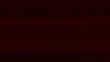 Mahogany wood surface seamless texture loop. Mahogany wooden board panel background. Horizontal along tree fibers direction. video
