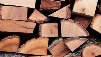 Timber butts stack texture. Lumber planks pile background. Wooden logging backdrop. video