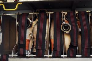 Close up view of firefighter's equipment that is inside of the truck photo