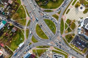 aerial view of road interchange or highway intersection. Junction network of transportation taken by drone. photo