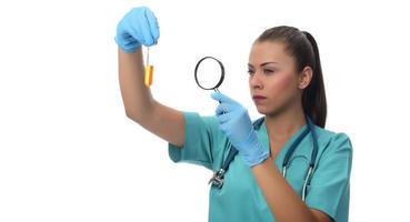 Portrait of serious doctor woman holding syringe with covid19 vaccine. photo