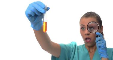 scientist working in the lab,  examines a test tube with liquid. medical concept. photo