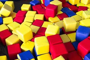 Kids playground with soft multi-colored cubes photo