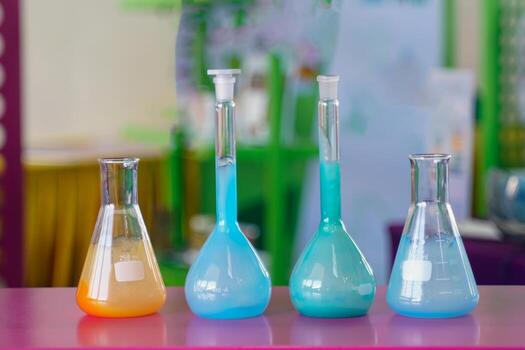 Erlenmeyer flask and Volumetric Flask is a scientific tool used in laboratories, use for solution made of glass can withstand heat well. Soft and selective focus. photo