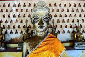 Buddhist sculptures in a temple in Bangkok, Thailand, circa May 2022 photo