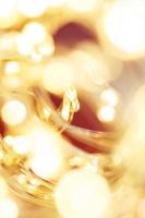 christmas beautifull shiny gold and red background. sparkle festive blurred bokeh photo