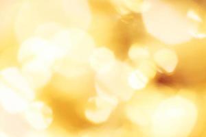 hermoso fondo de oro brillante de navidad. brillo festivo bokeh borroso foto