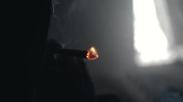 Man Lights A Cigarette In Dark - Stock Video