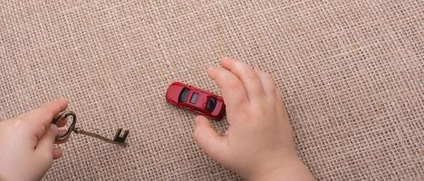 Toy car as a transportation devices in hand