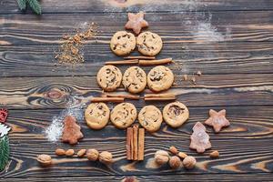 Sweets and cookies. Christmas background with holiday decoration photo