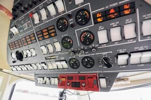 Different displays. Close up focused view of airplane cockpit photo