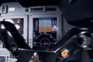 Close up focused view of airplane cockpit photo