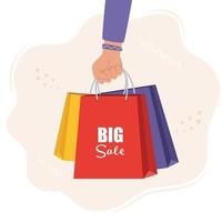 Hand with multicolored shopping bags. Big sale concept vector Illustration.