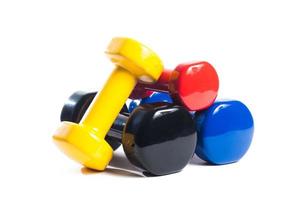 Rubber dumbbells of different colors photo