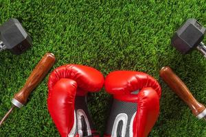 Boxing gloves, skipping rope, dumbbells photo