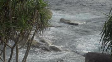 Turquoise waves rolled on the beach of Koh Miang island, Similan Islands, slow motion video