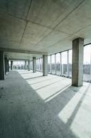 Indoors in the unfinished building. Conception of construction photo